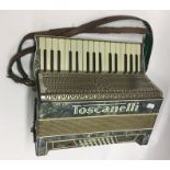 A Toscanelli accordion. Est. £20 - £30.