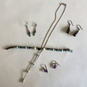 Silver necklaces together with other silver earrin