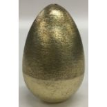 STUART DEVLIN: A silver and silver gilt egg of typ
