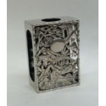 A Chinese silver match case decorated with bamboo