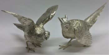 A pair of exquisite cast silver pheasants with tex