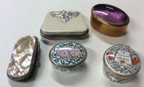 A collection of modern oval snuff boxes, pill box