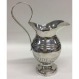 An Italian silver half fluted ewer. Approx. 243 gr