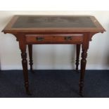 An Edwardian single drawer writing desk with leath