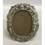 A novelty Chinese oval silver picture frame decora