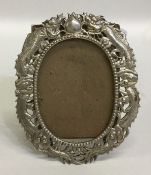 A novelty Chinese oval silver picture frame decora