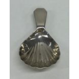 A Georgian silver fluted caddy spoon. London. By S
