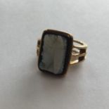 A hard stone cameo gent's signet ring in gold band