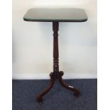 A Continental mahogany pedestal wine table with gl