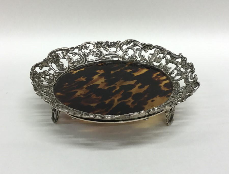 A stylish silver and tortoiseshell letter tray emb