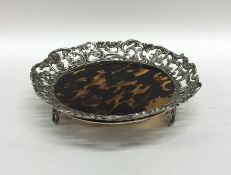 A stylish silver and tortoiseshell letter tray emb