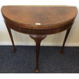 An Edwardian hinged top D-shaped card table. Est.