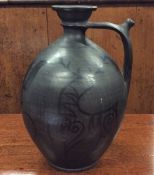 An unusual Continental stoneware flagon decorated