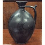 An unusual Continental stoneware flagon decorated