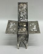 A novelty silver stamp box in the form of a table,