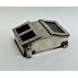 A novelty double sided stamp box with hinged top o