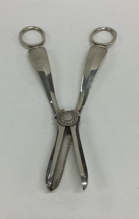 A pair of Georgian style silver grape scissors. Sh