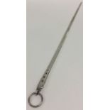 A Portuguese silver meat skewer with ring thumb pi