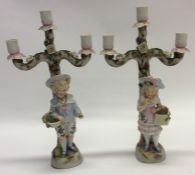 A pair of decorative porcelain candelabra. Approx.