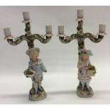 A pair of decorative porcelain candelabra. Approx.