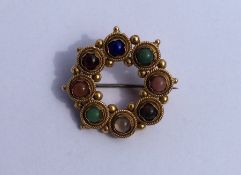 A circular Antique multi agate brooch with ball de