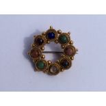 A circular Antique multi agate brooch with ball de