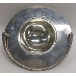 A large Colonial ? silver strainer with swing hand