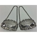 A pair of silver sherry labels. London. By FH. App