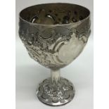 A heavy Portuguese silver embossed goblet with gil
