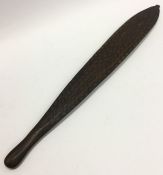 A hardwood tribal spear with carved decoration. Ap