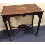 An Edwardian inlaid side table with urn decoration