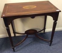 An Edwardian inlaid side table with urn decoration