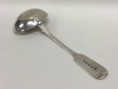 EXETER: A silver fiddle pattern sauce ladle. By J