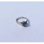 A zircon single stone ring in white gold claw moun