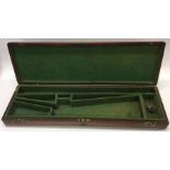 An Antique mahogany shotgun case with brass handle