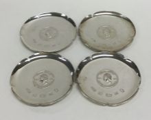 A good set of four circular armada type silver dis