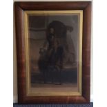 A large rosewood framed print depicting a gentlema