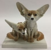 An unusual Meissen figure of dogs with pricked up