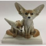 An unusual Meissen figure of dogs with pricked up