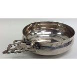 A rare Queen Anne silver bleeding bowl with pierce