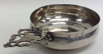 A rare Queen Anne silver bleeding bowl with pierce