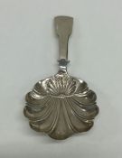 An unusual Georgian silver caddy spoon with fiddle