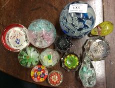 A quantity of old glass paperweights. Est. £20 - £