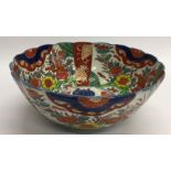 An Imari fruit bowl decorated with bright flowers.