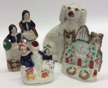 Three Staffordshire figures together with a Staffo