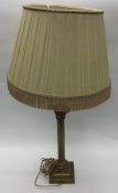 A brass Corinthian column mounted as a lamp. Est.