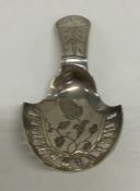 A good Georgian bright cut silver caddy spoon, the