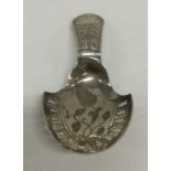 A good Georgian bright cut silver caddy spoon, the