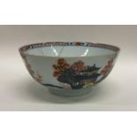 A Chinese decorated bowl with floral border. Appro