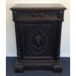 A Continental oak carved chest with single drawer.